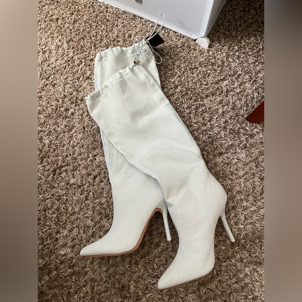 Jean tall boot heels